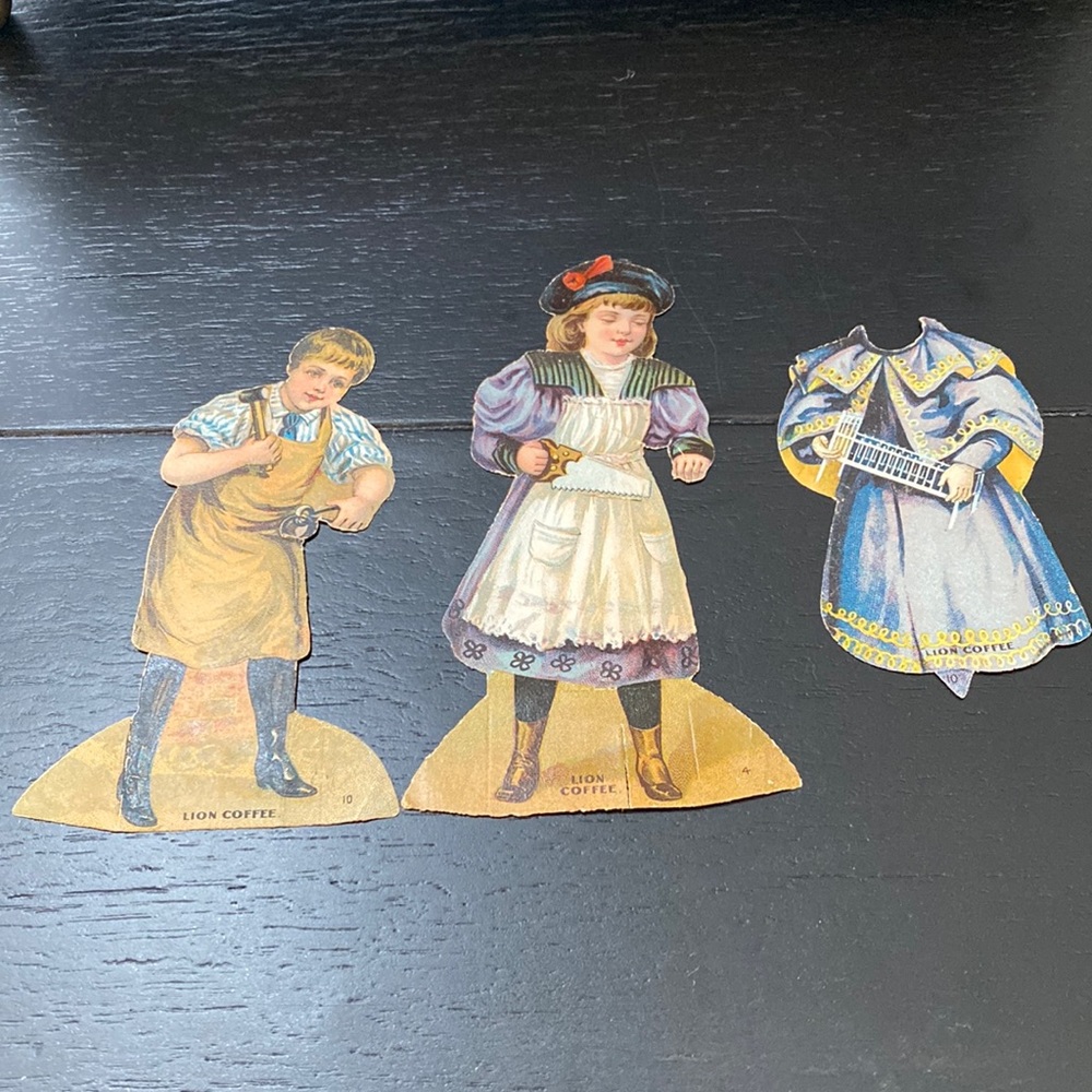 Antique Lion Coffee advertising cut outs by plus one outfit change. Unique.
